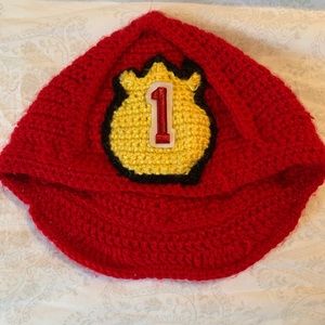 Hand knitted fire hat age 9 mo to 3 years.